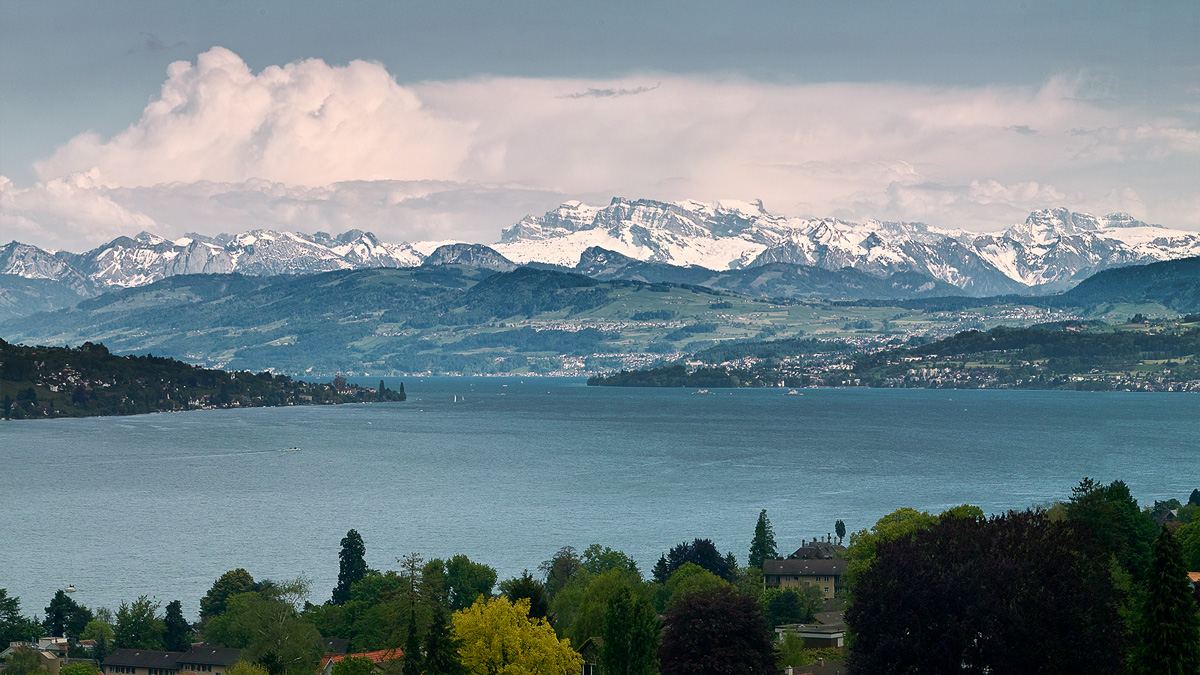 View of Ruschlikon at lake Zurich and the swiss alps.